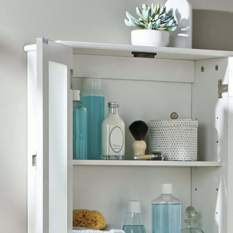Interior view of the storage cabinet displaying the spacious shelving arrangement for bathroom essentials.