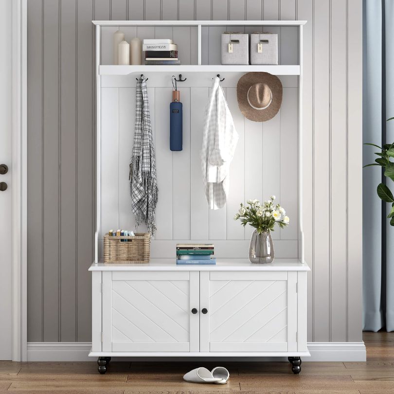 Front view of the elegant white hall tree with a coat rack and bench