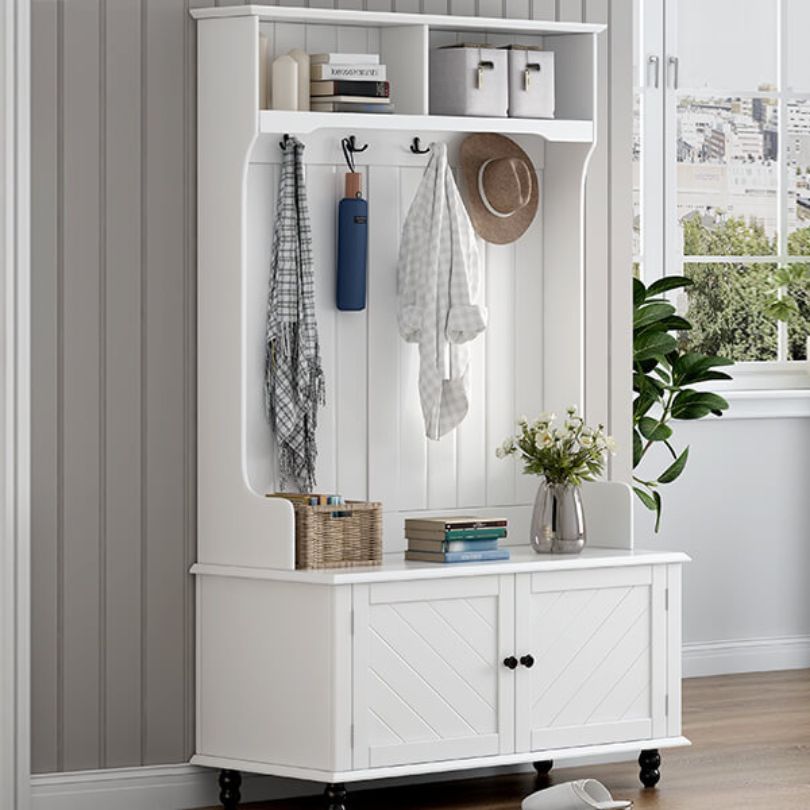 Close-up of the coat hooks on the stylish hall tree for small spaces