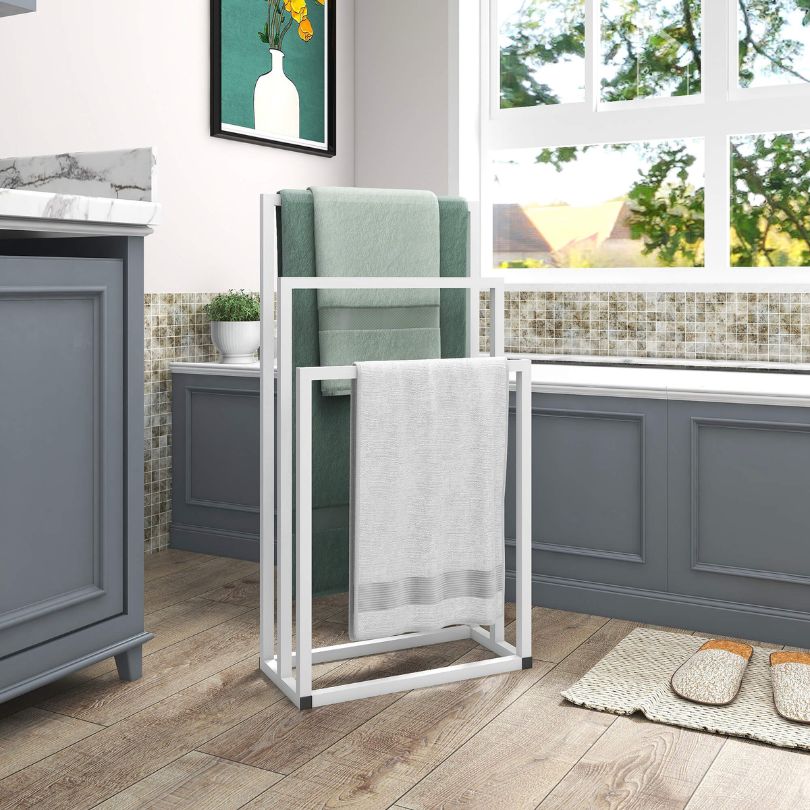 Towel rack in a compact bathroom, demonstrating its space-saving design.