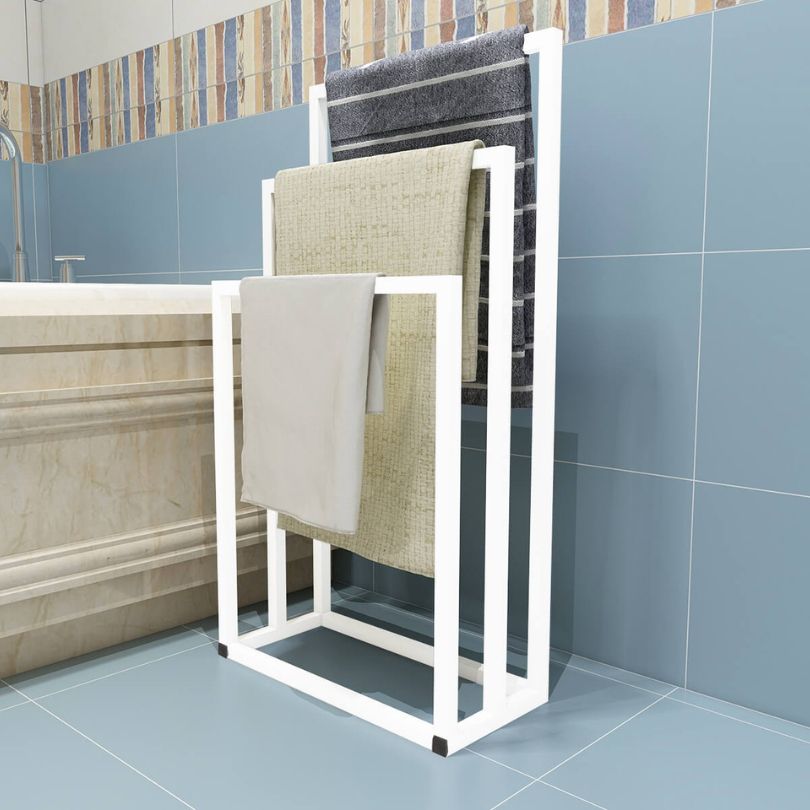 Freestanding 3-tier towel rack showcasing towels in a stylish bathroom setting.