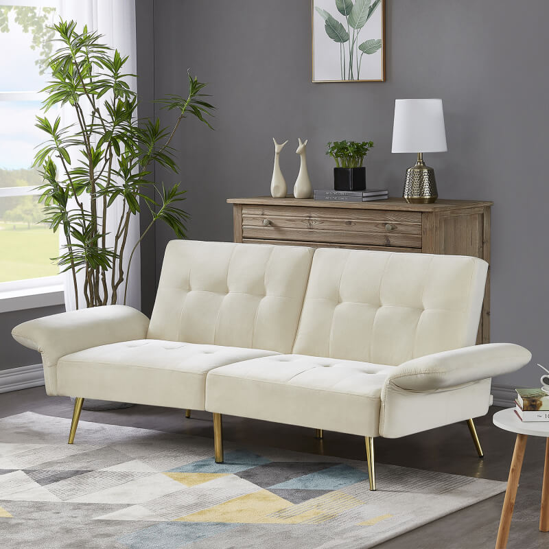 Chic white velvet futon loveseat with gold legs in stylish interior