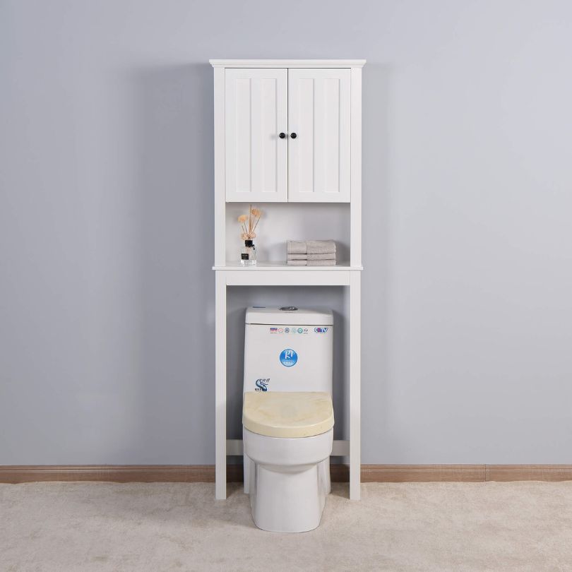 Chic white wood space saver cabinet with doors in a bright bathroom setting.