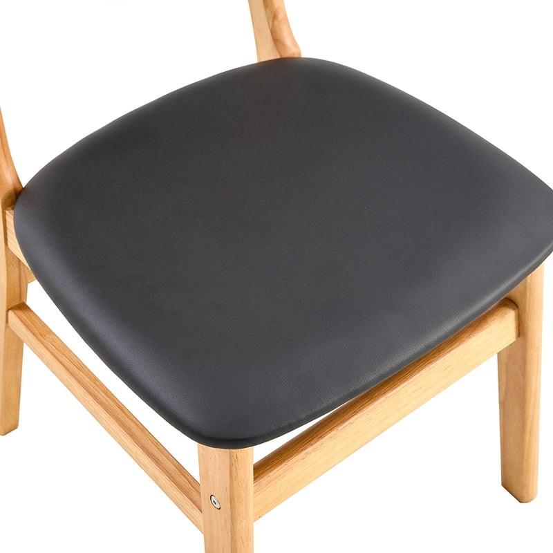 Solid wood dining chairs showcasing their modern design and sturdy build.
