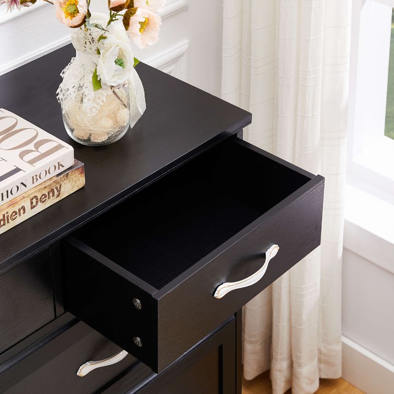 Close-up view of the antique handles on the Elegant 9-Drawer Wooden Double Dresser, highlighting its craftsmanship.