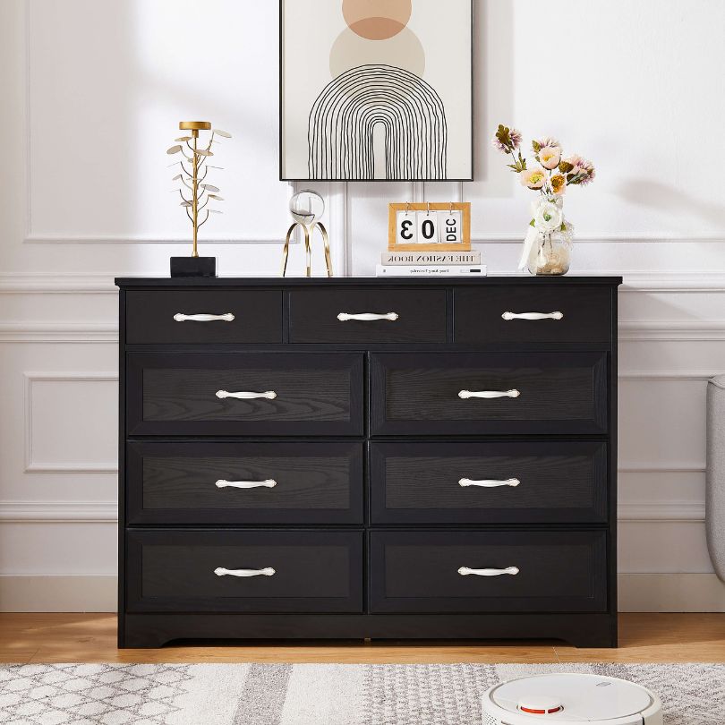 Spacious interior of the Elegant 9-Drawer Antique Wooden Double Dresser demonstrating ample storage for clothes and accessories.