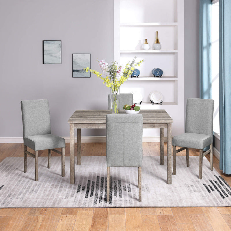 Close-up of rustic furniture details on the antique dining table with chairs