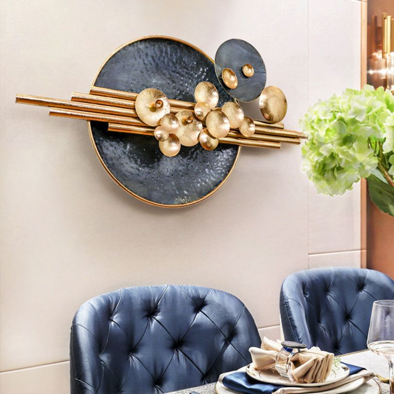 Close-up of elegant wrought iron wall hanging showcasing intricate design.