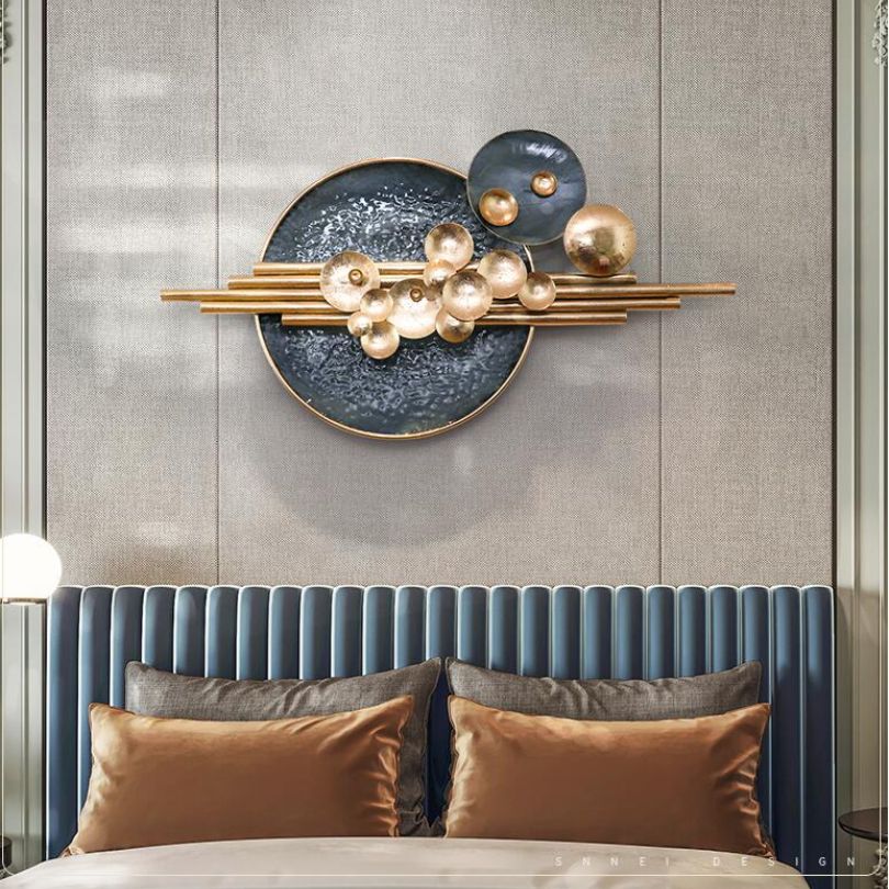 Close-up of elegant wrought iron wall hanging showcasing intricate design.
