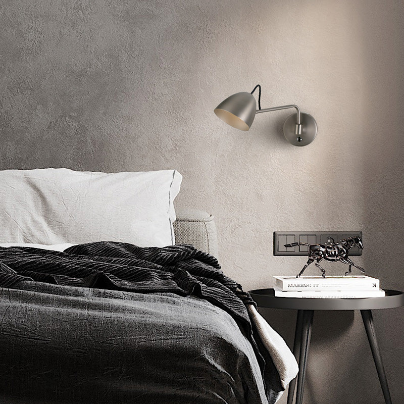 Adjustable wall light with rocker arm shown in a living room corner — top rated modern lighting for living room.