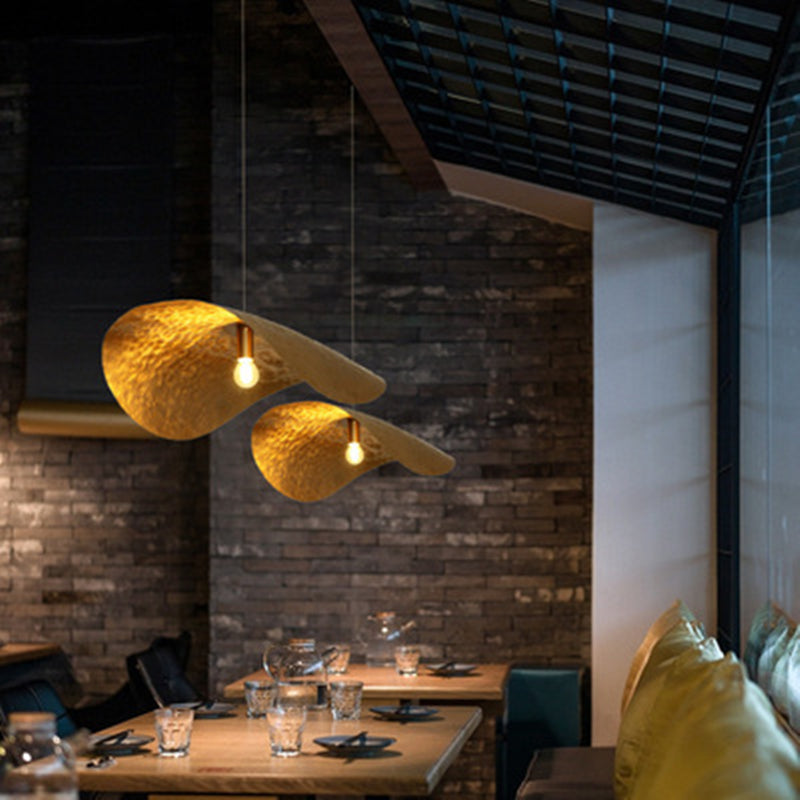 Close-up view of the handmade copper pendant light highlighting its unique hammered finish, suitable for any modern space.