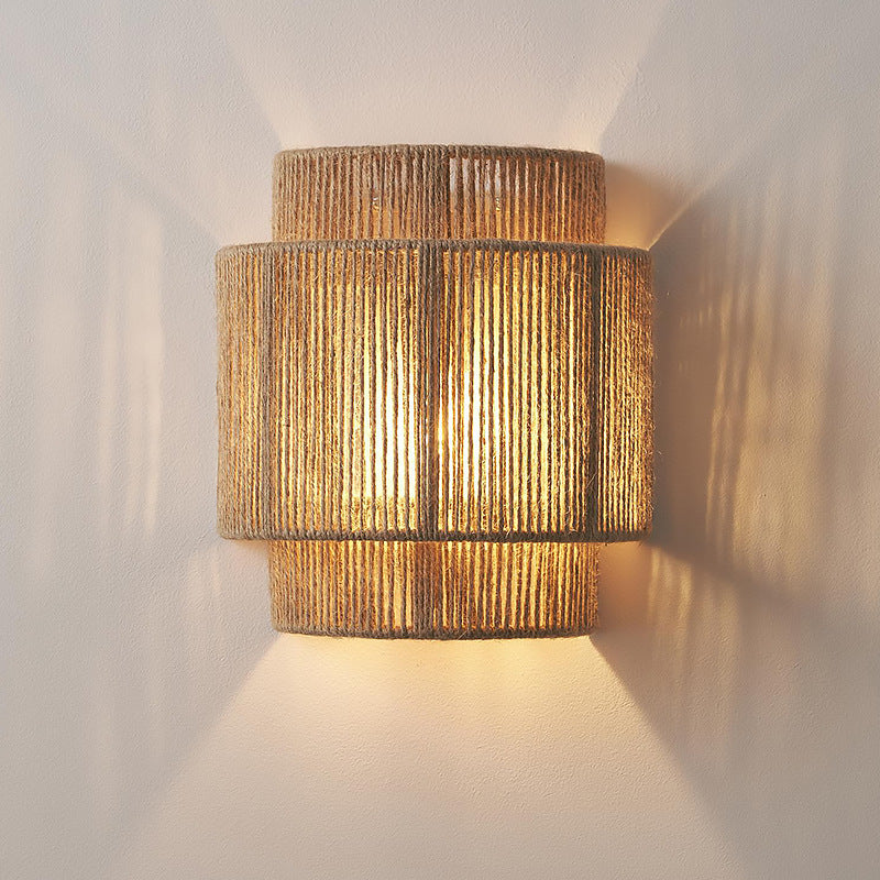 Stylish Hemp Rope Wall Light illuminating a modern living room with bohemian decor.