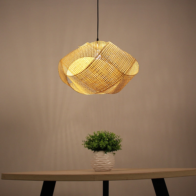 Bamboo rattan lamp positioned in a modern bedroom, enhancing the ambiance with its soft illumination.