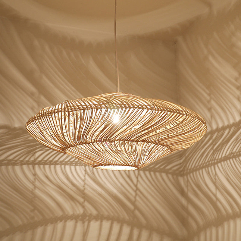 Close-up view of the wicker ceiling lamp, emphasizing its handmade craftsmanship.
