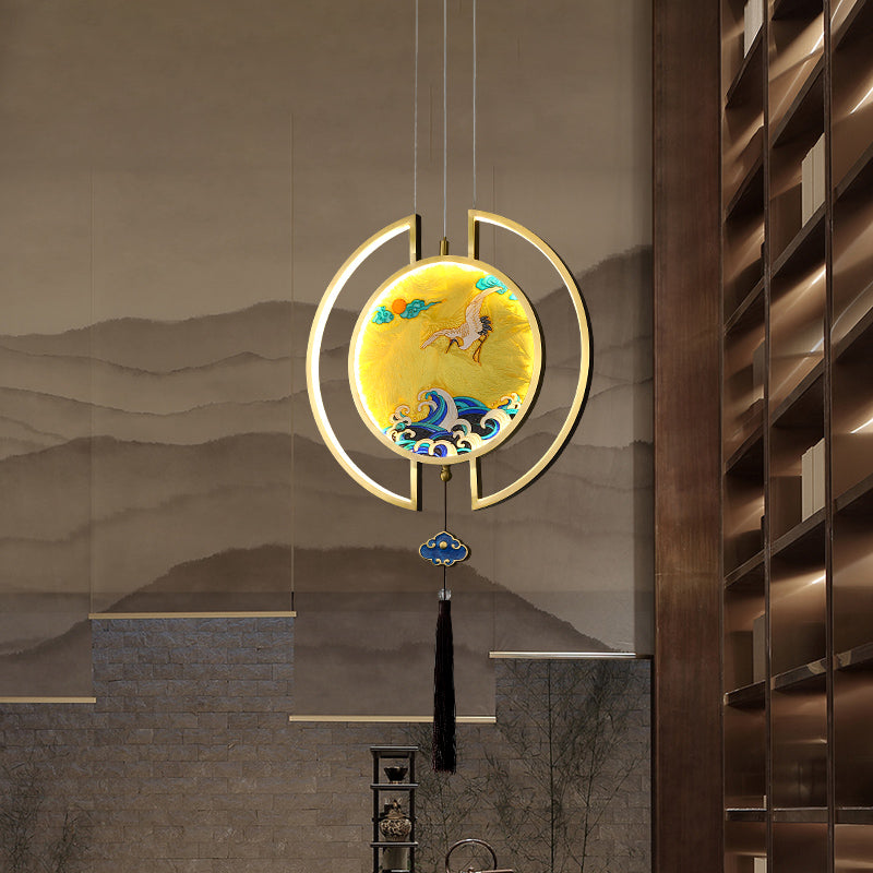 The pendant light installed above a dining area, highlighting its unique charm and decorative appeal.