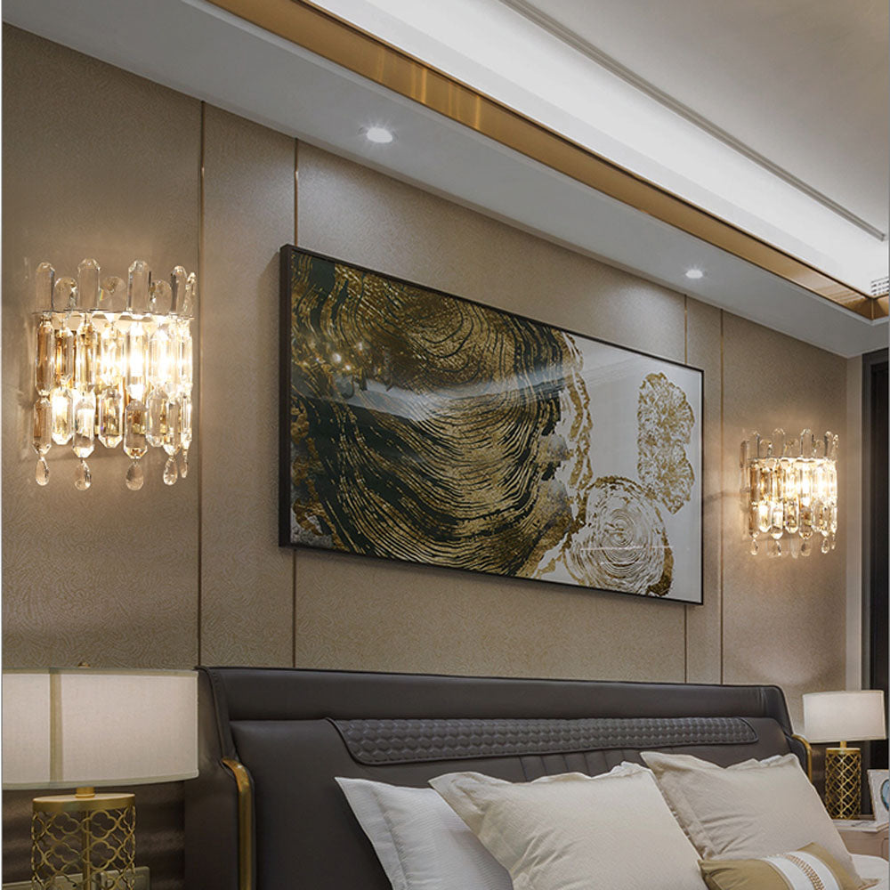 Elegant gold crystal wall lamp showcasing LED light with a modern design.