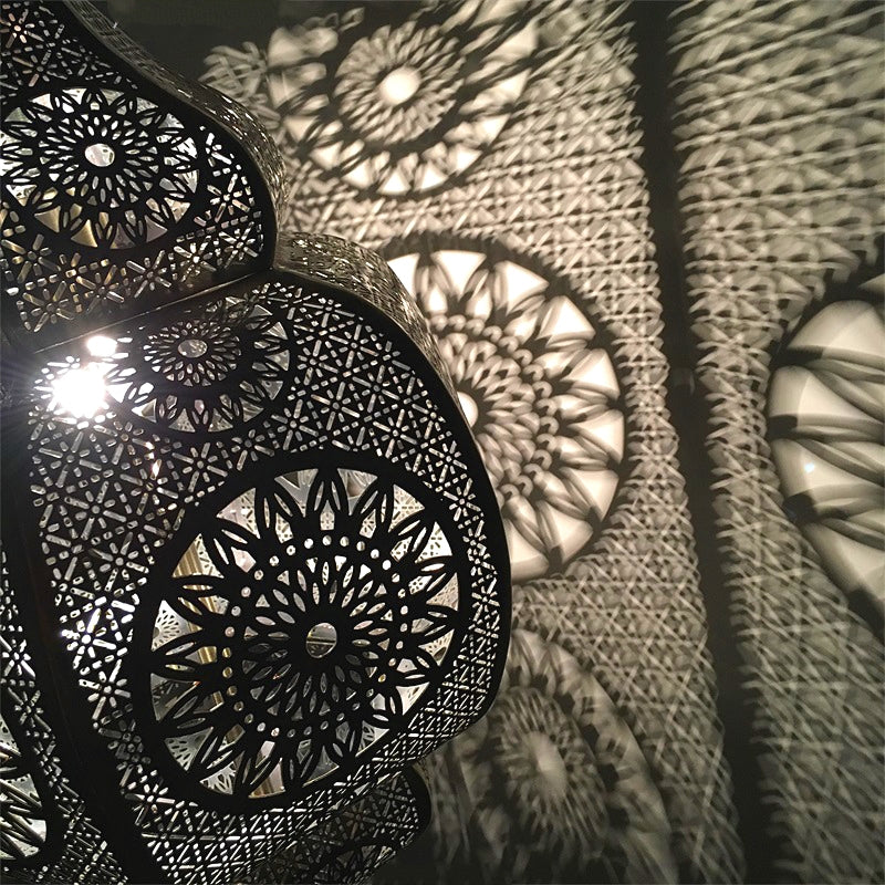 Close-up of the Moroccan pendant light highlighting its unique floral pattern.