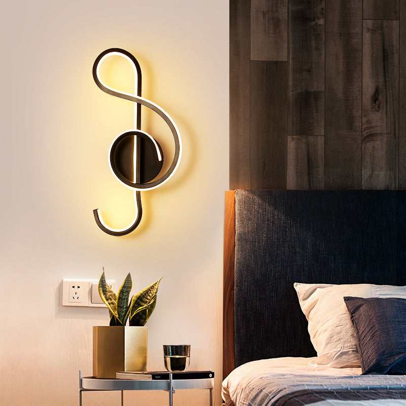 Side angle of creative wall lamp with musical note shape mounted in a modern kitchen