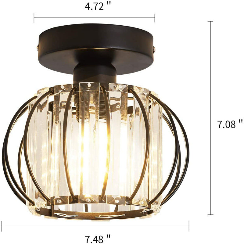 Elegant black crystal flush mount light illuminating a dining room