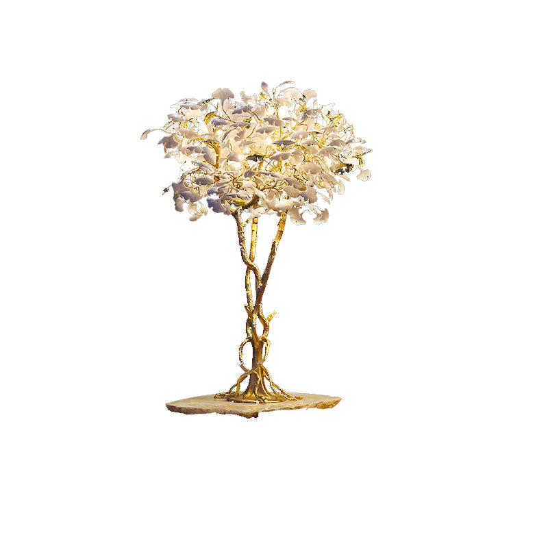 Close-up of the decorative light showcasing the natural ostrich feather shade.