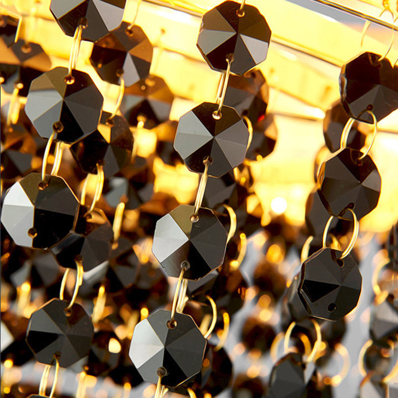 Elegant installation of the luxury chandelier in a modern dining room setting.