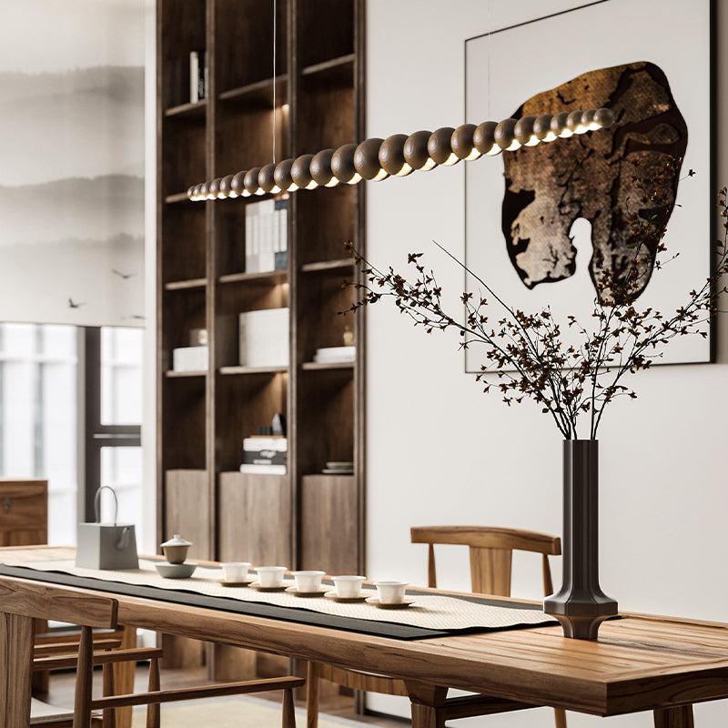 The pendant light illuminating a stylish dining area, creating a warm ambiance.