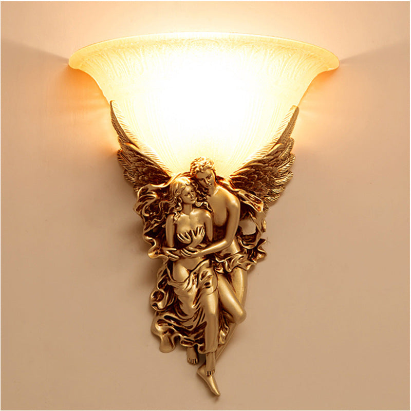 Close-up of the high quality glass shade of the angel wall light.