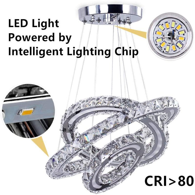 Elegant 3-ring crystal LED pendant light in a contemporary dining room setting.