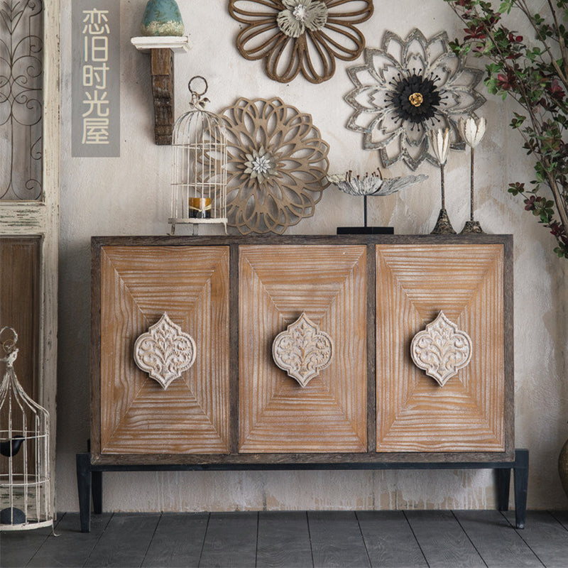 Spacious top surface of the modern farmhouse sideboard with decorative items displayed.