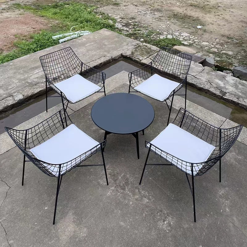 Elegant patio chair made of stainless steel, showcasing its weather-resistant qualities.