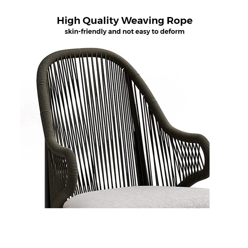 Modern outdoor leisure chair with footstool in a stylish patio setting.