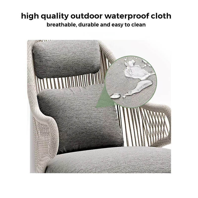 High-quality outdoor chair and footstool set positioned on a balcony.