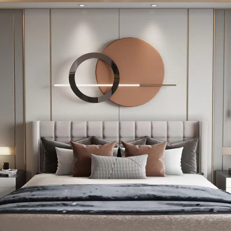 Art Deco LED wall sconce showcasing elegant circular plates and multicolored finish in a cozy living room setting.