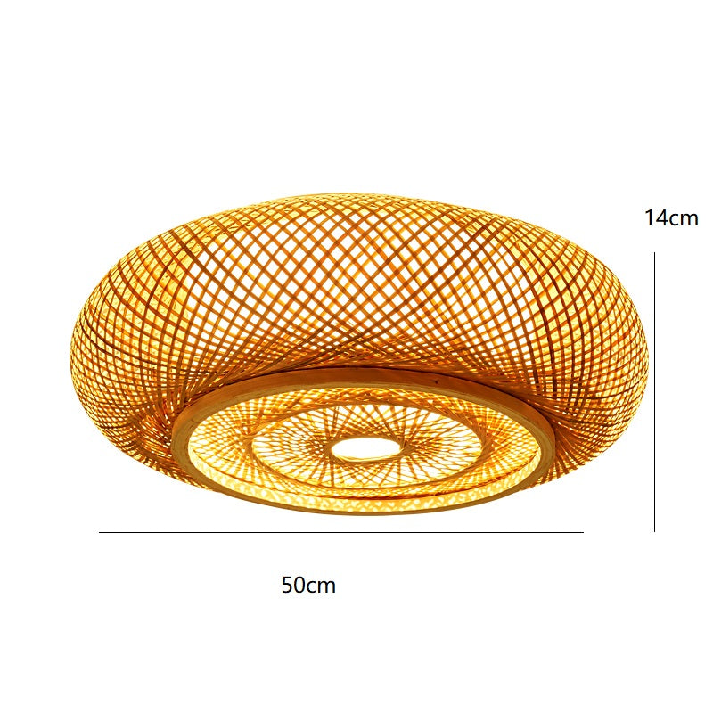 Bamboo ceiling light casting a warm glow in a modern bedroom.