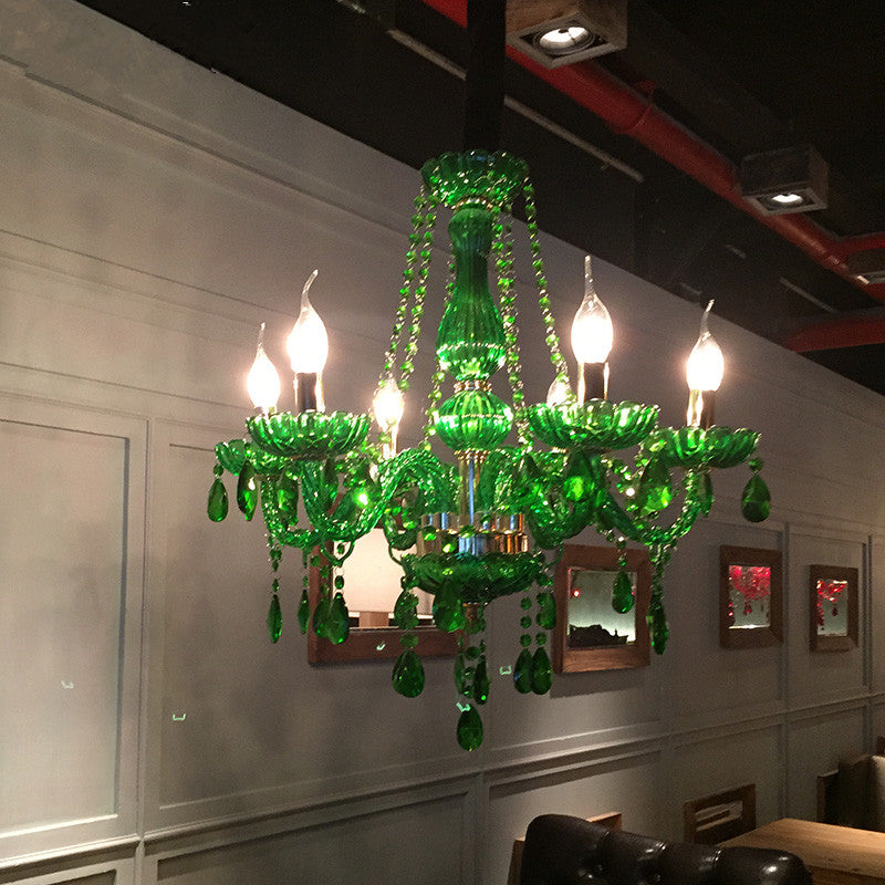 Close-up view of the modern green chandelier showcasing its intricate crystal details.