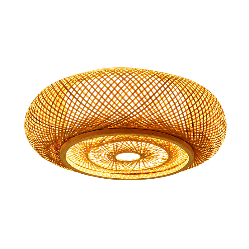 Elegant bamboo flush mount light illuminating a cozy dining room.