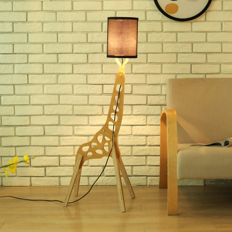 Nordic wooden giraffe floor lamp showcasing its unique design in a modern living room setting.