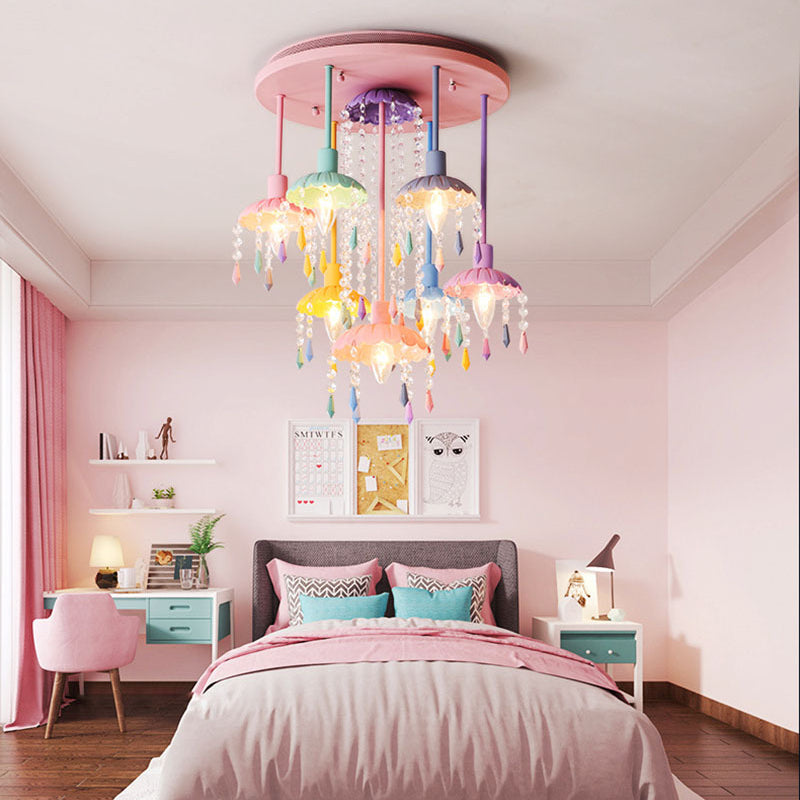 Close-up view of the pink Macaron chandelier showcasing its crystal details.