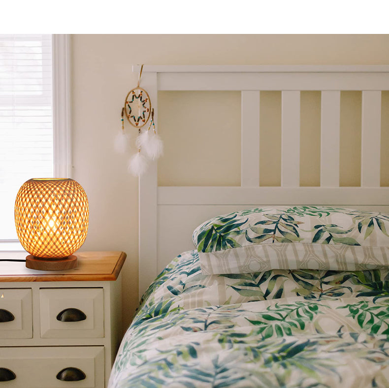 Handwoven rattan table lamp in an office setting, adding a touch of elegance and comfort.
