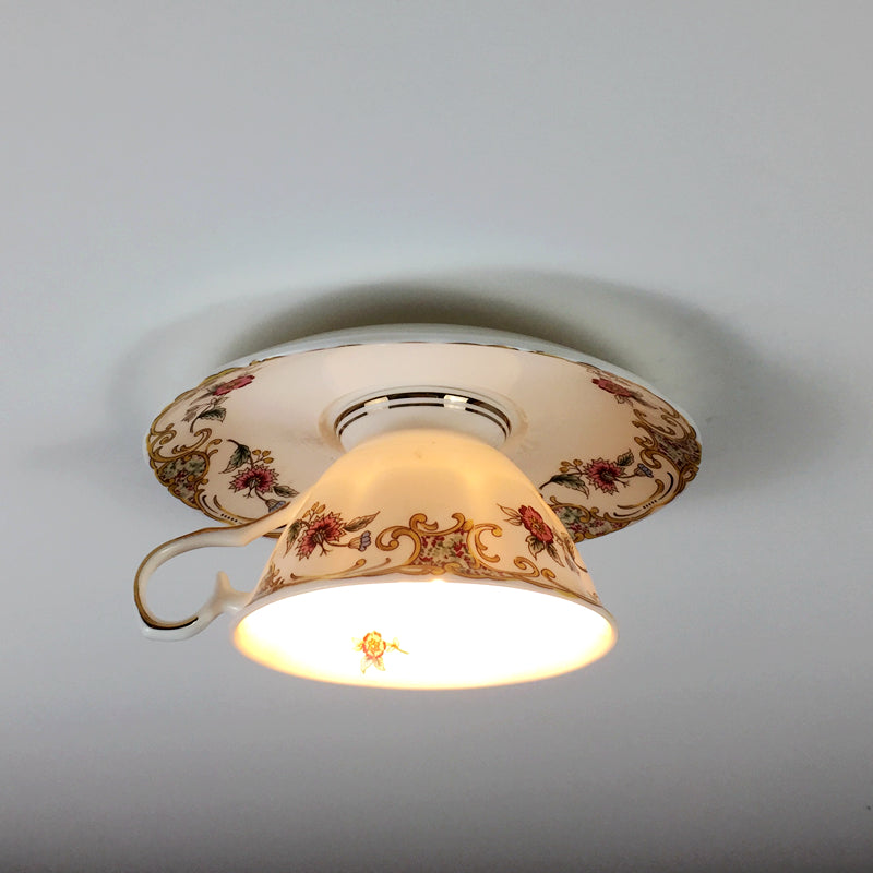 Close-up view of the ceramic ceiling light demonstrating its intricate details and stylish finish.