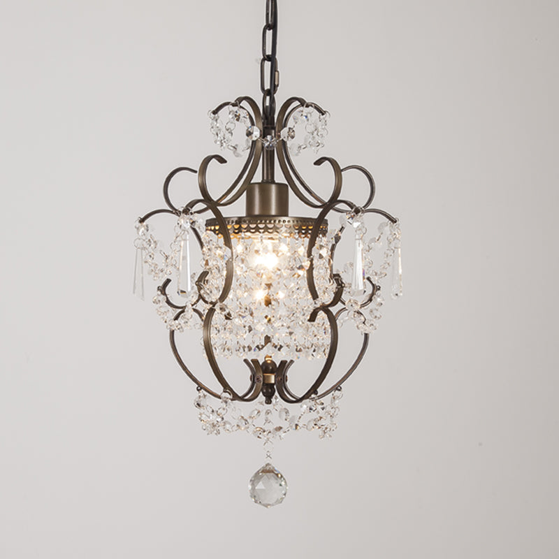 Elegant mini geometric crystal chandelier showcasing stunning light patterns in a cozy living room.