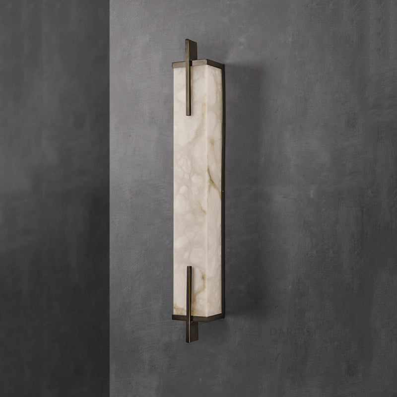 Stylish wall lamp installed on a patio, demonstrating its suitability for outdoor use.