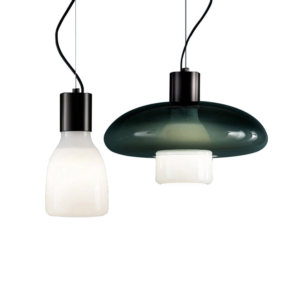 Chic green glass pendant light showcasing its elegant design in a contemporary living room setting.
