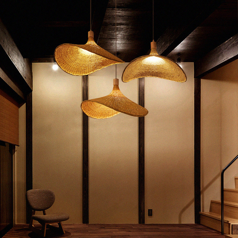 The intricate weaving of the bamboo wicker pendant light showcasing its natural texture.