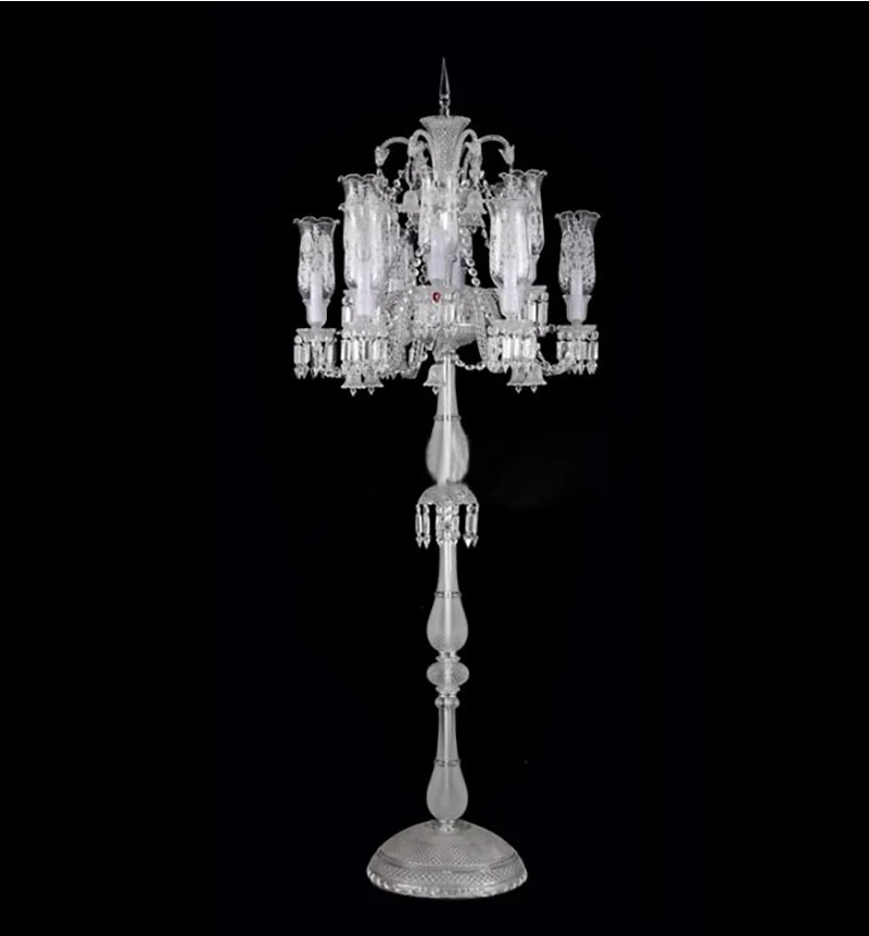 Elegant crystal chrome floor lamp showcasing its stylish round base in a contemporary living room.