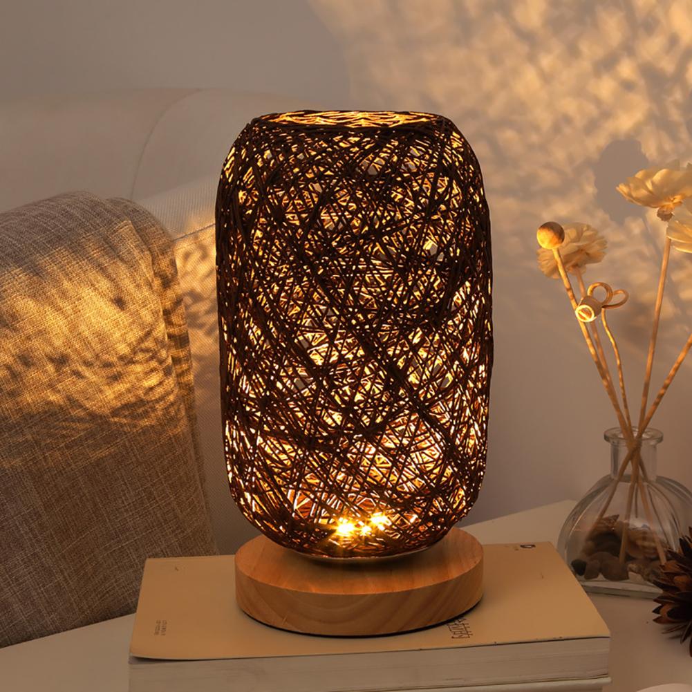 Close-up of the rattan lamp showcasing its bamboo wood base and dimmable LED feature.
