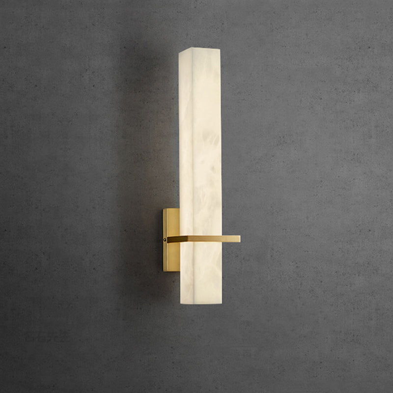 The LED wall lamp illuminating a modern foyer, showcasing its sleek design.