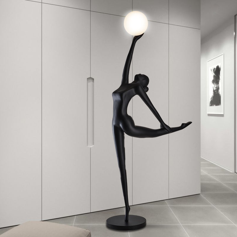 Elegant Nordic ballet dancer floor lamp in living room setting