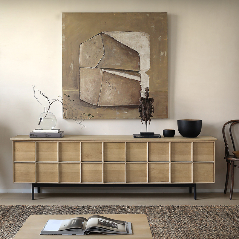 Side view of the TV stand highlighting the walnut veneer finish and spacious compartments.