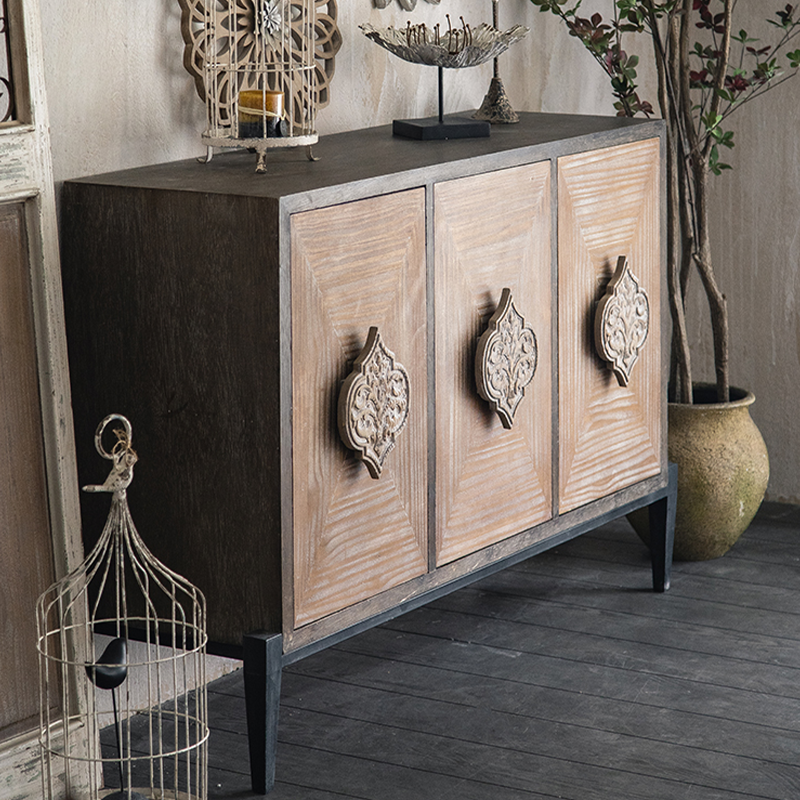 Spacious top surface of the modern farmhouse sideboard with decorative items displayed.